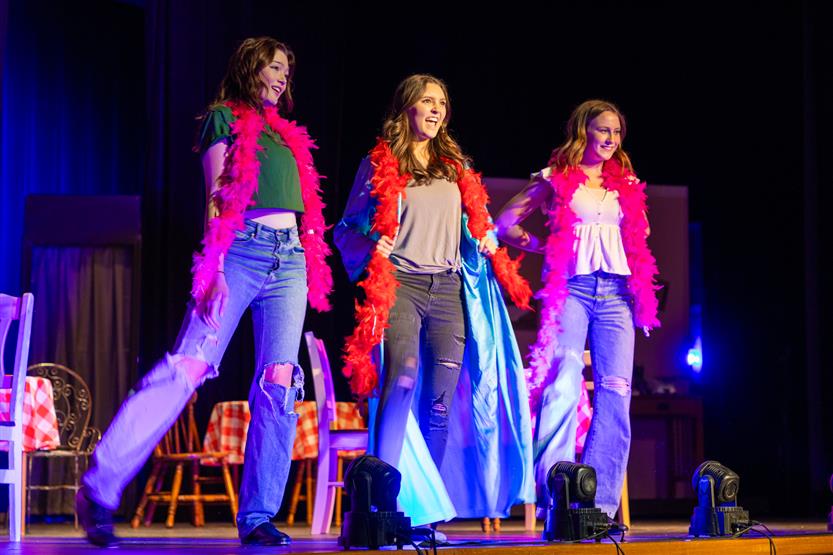 Students perform onstage